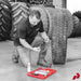 Technician using Safety Seal Deluxe Truck Kit to repair a large truck tyre