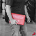 Person carrying the Safety Seal Deluxe Truck Kit case