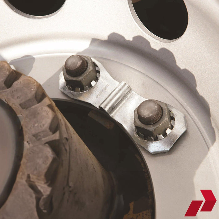 Prolock Wheel Nut security clamps close up attached to a wheel